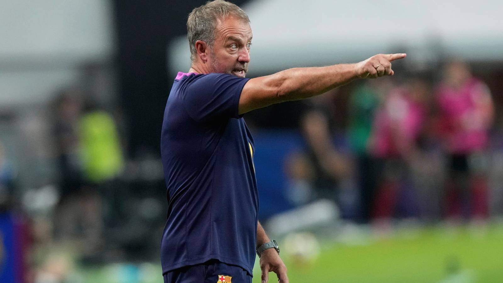 Why was Barcelona coach Hansi Flick handed a one-match ban by UEFA