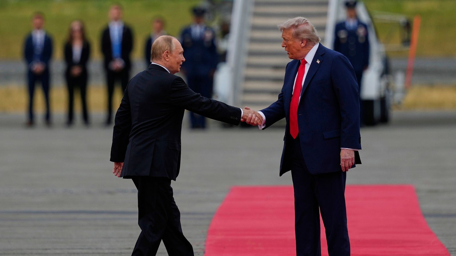 Historic handshake, warm smiles and a ride together in ‘The Beast': What happened when Trump met Putin