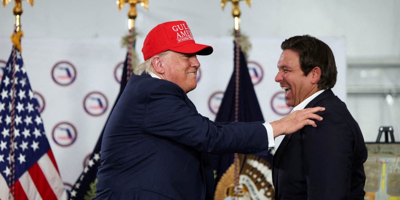 Trump Reunites With Former Political Rival DeSantis at ‘Alligator Alcatraz'