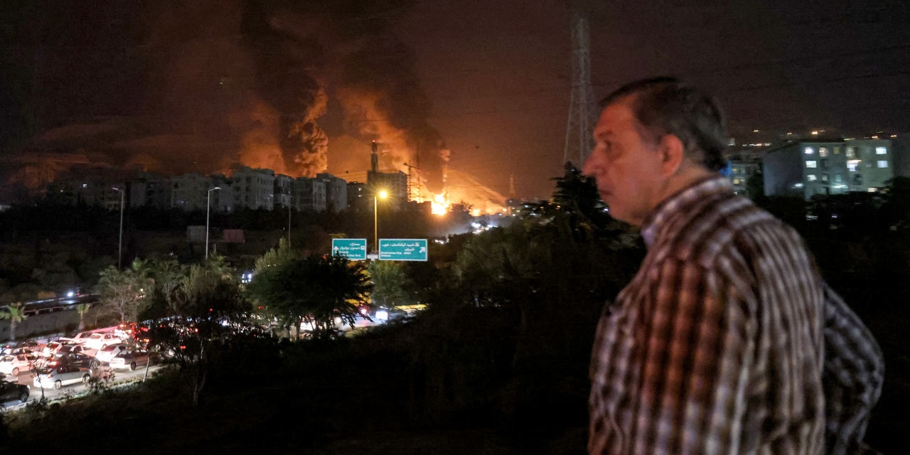 Israel Warns Tehran District to Evacuate as Residents Flee Iran's Capital
