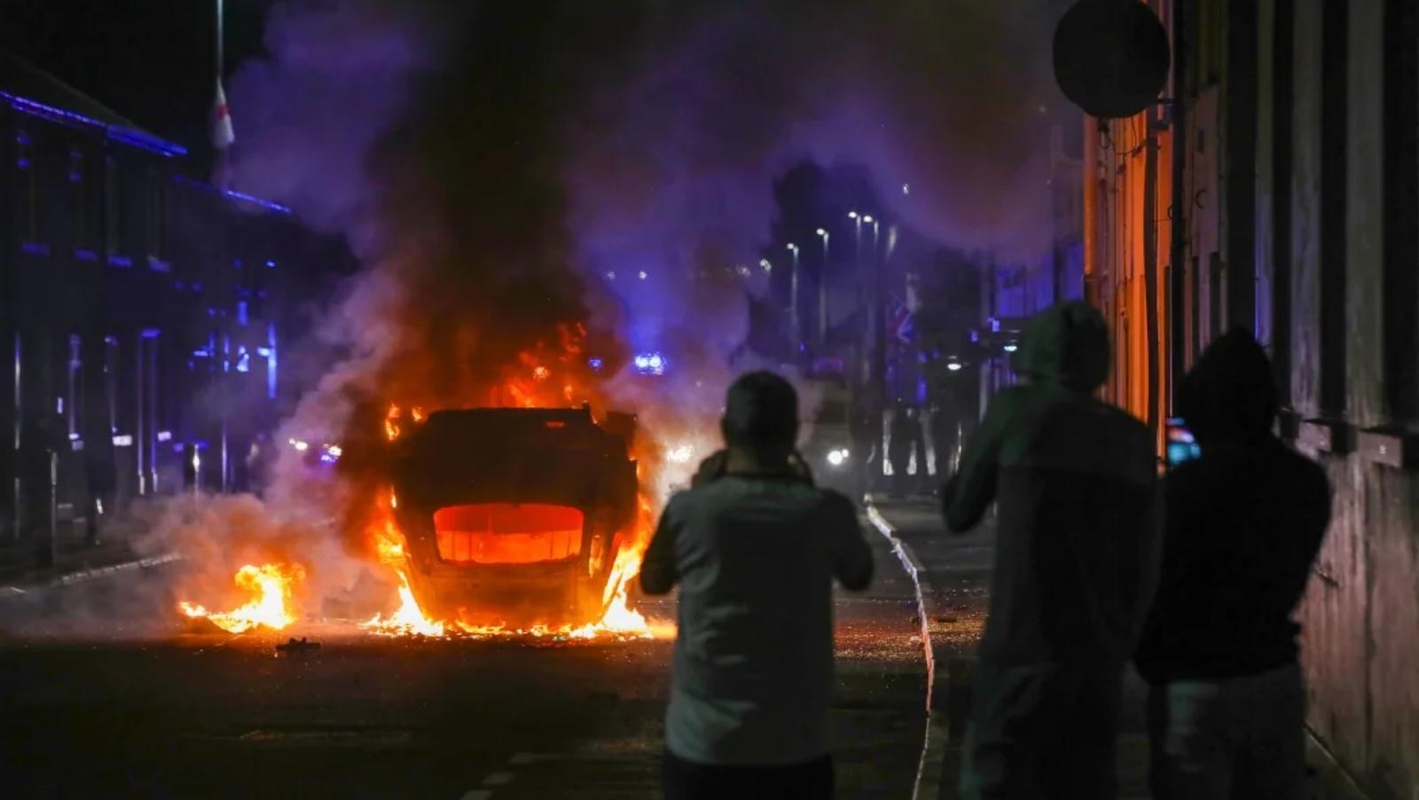 Northern Irish rioters attack police, torch houses for second night