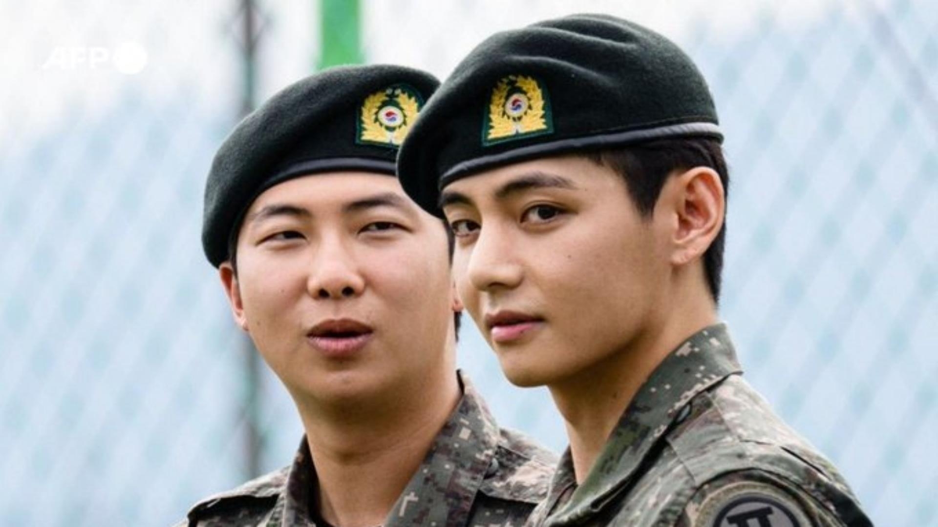 Two BTS megastars released from South Korea military