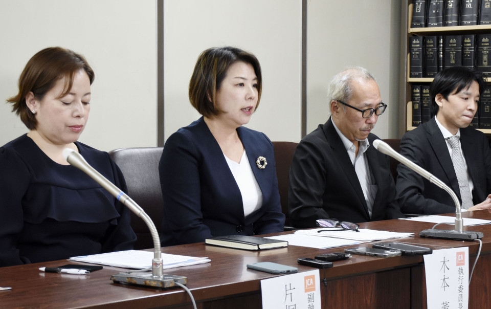 Japan court orders airline to pay damages, grant breaks to crew