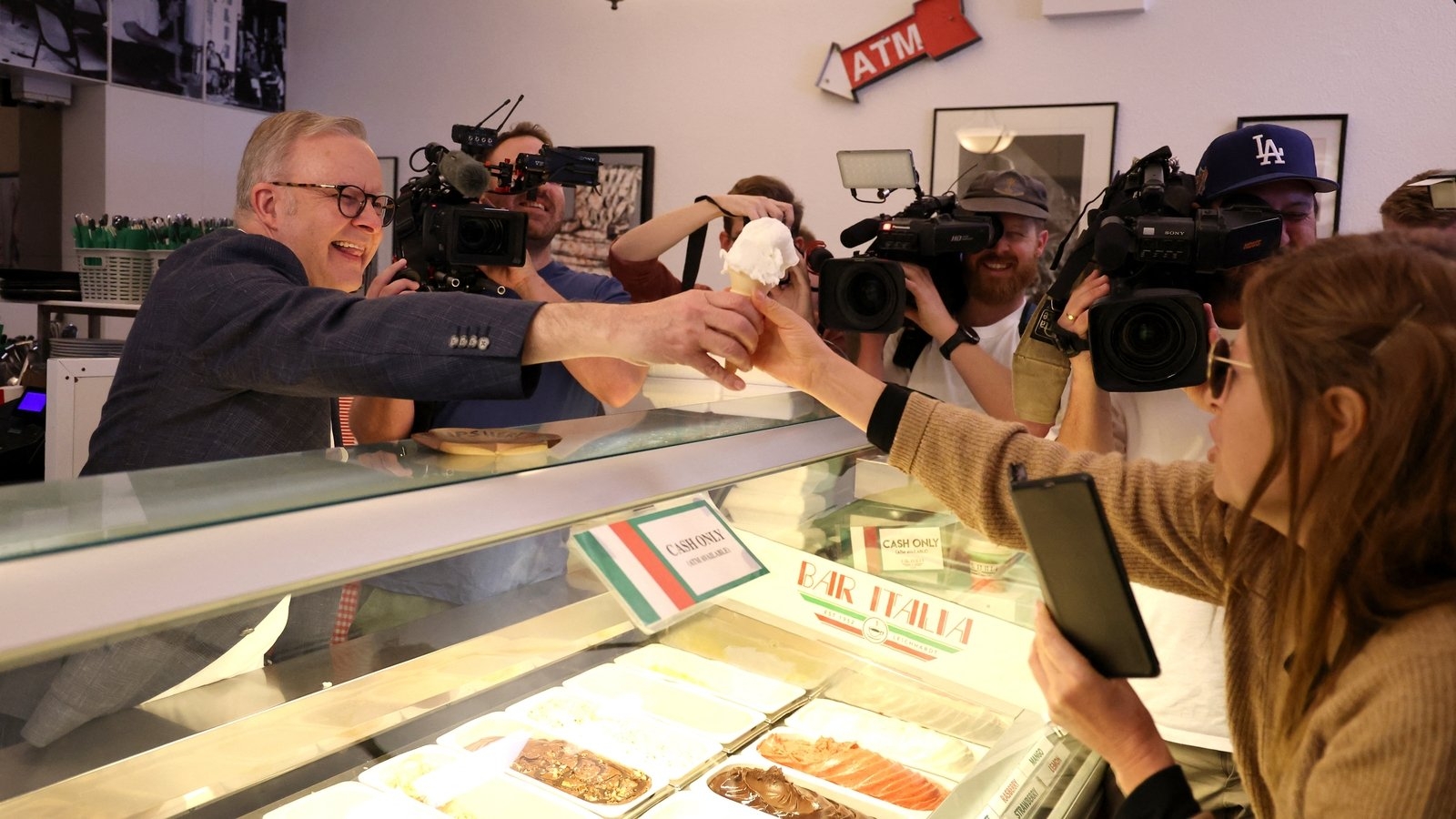 Australian PM basks in win, vows 'orderly' government