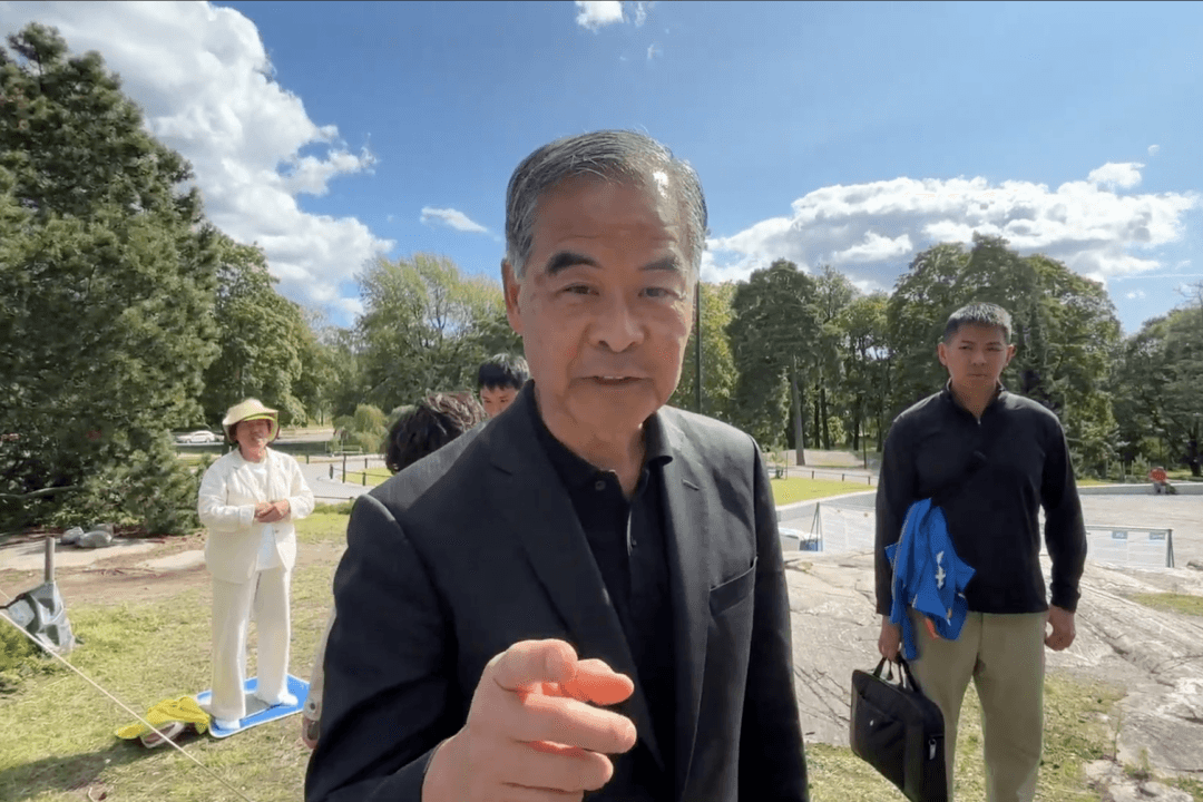 Former Hong Kong Leader Threatens Falun Gong Practitioners in Finland