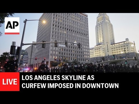 Los Angeles police swiftly enforce downtown curfew