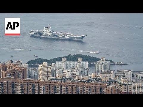Chinese aircraft carrier sails into Hong Kong for first time