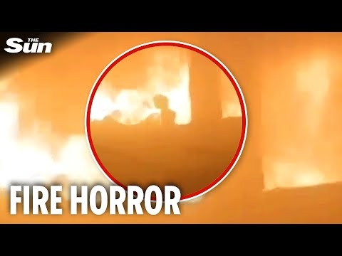 Video shows girl running through burning Gaza school after Israeli bombing