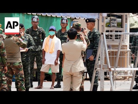 Thailand returns 2 wounded soldiers to Cambodia but continues to hold 18 of their comrades