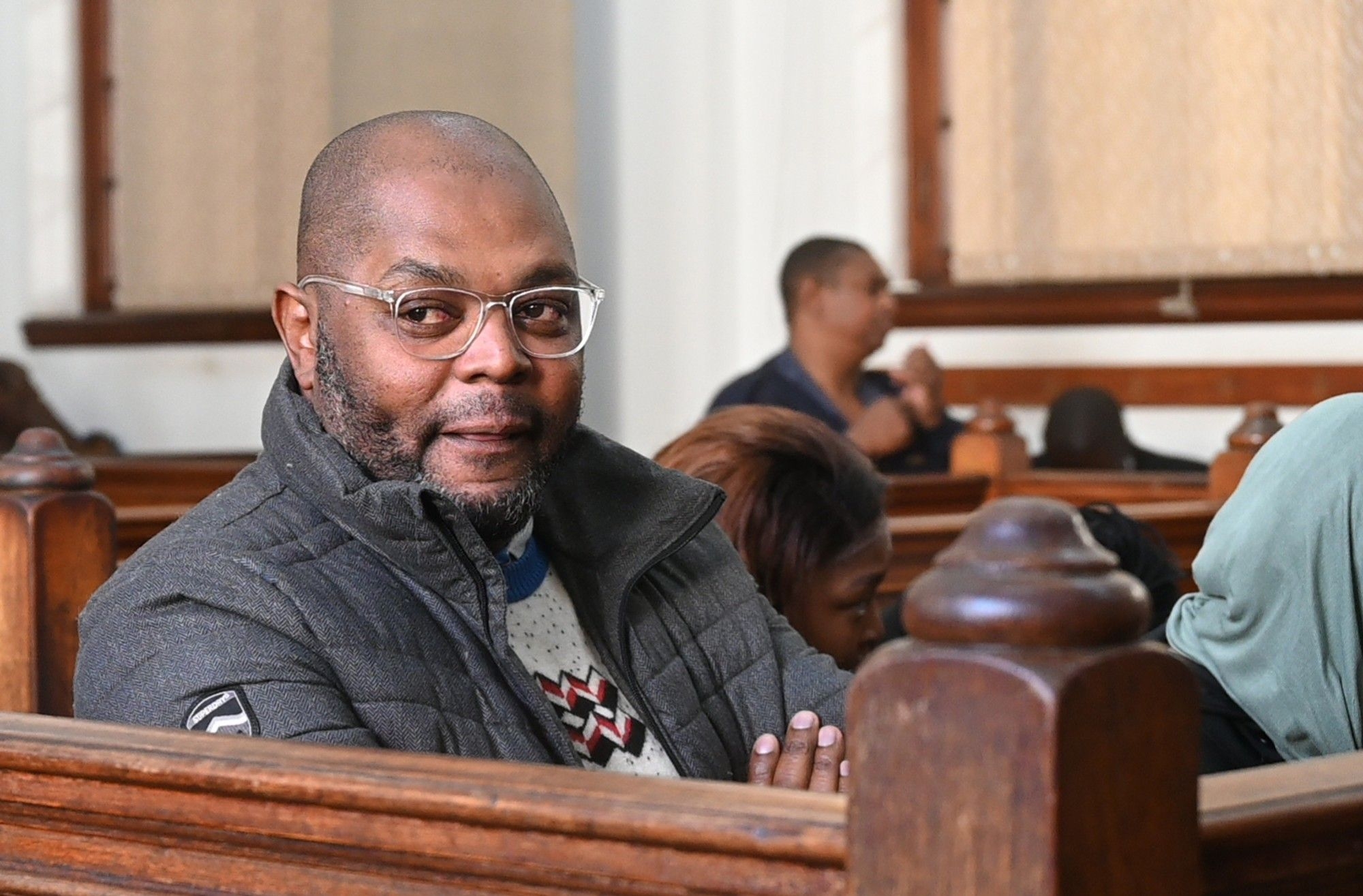 What led to the withdrawal of R1 billion fraud charges against Malusi Booi and his co-accused?