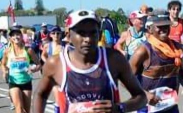 Pastor running towards his 21st Comrades Marathon