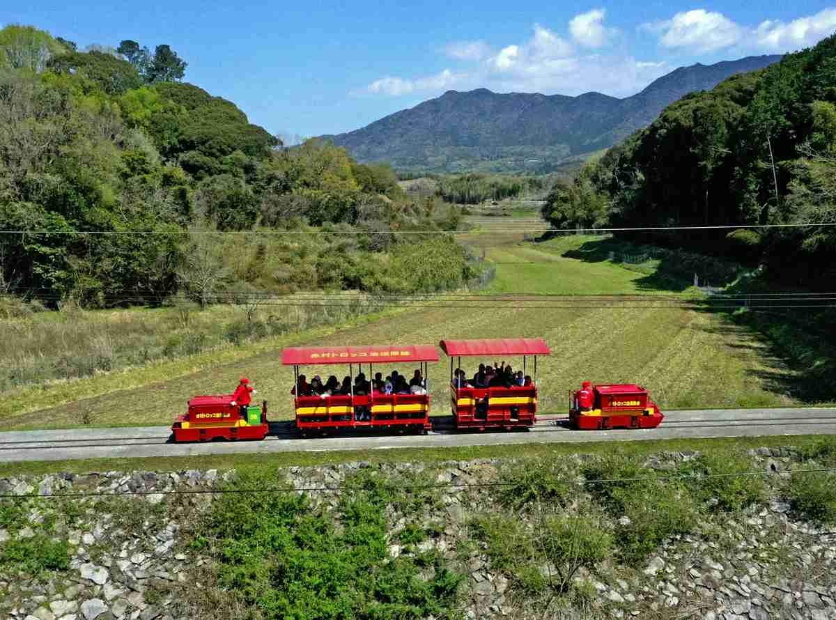 Fukuoka: Red Trolley Train Runs Through Mountainous Village; Passengers Get Once-in-a-Month Experience