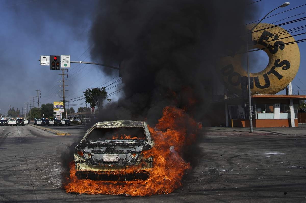 Protesters and Immigration Authorities Face off for a Second Day in LA Area after Arrests