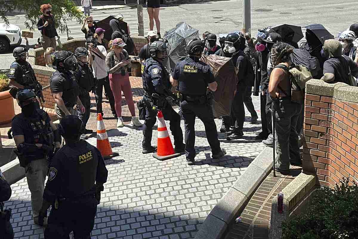 Protests over Immigration Raids Pop up across the US with More Planned