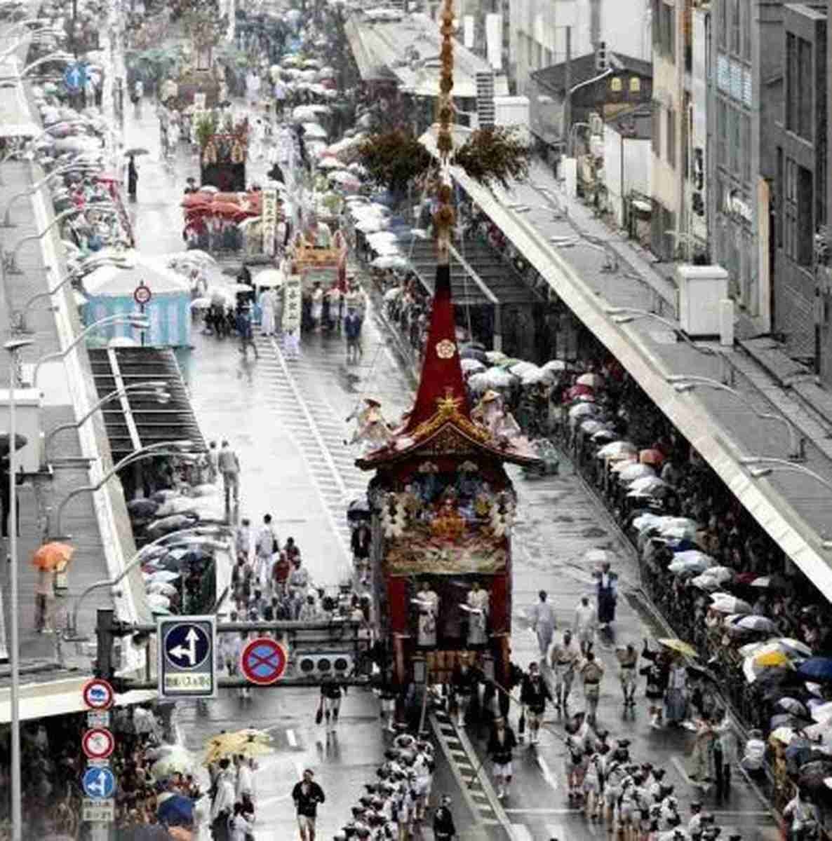 Yamahoko Float Procession Held in Kyoto's Gion Festival in Rain; Festival Dates Back to Heian Period