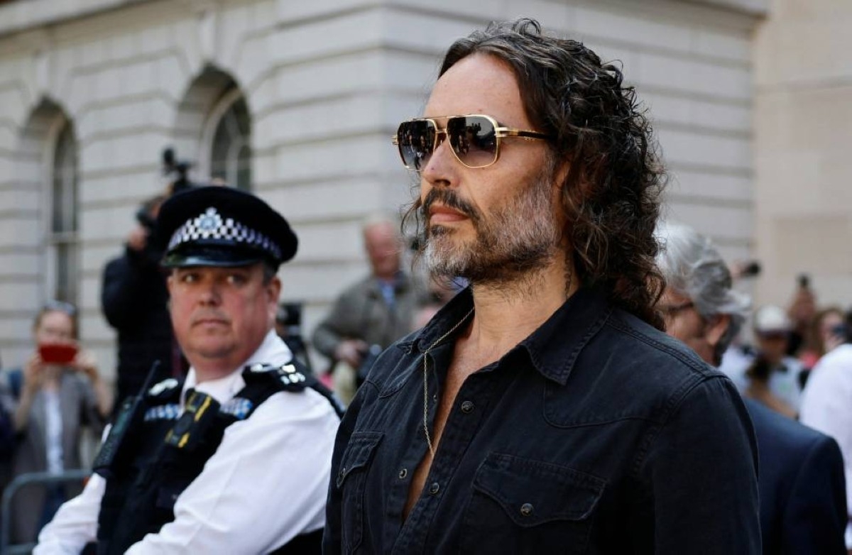 UK comedian Russell Brand appears in court on rape charges