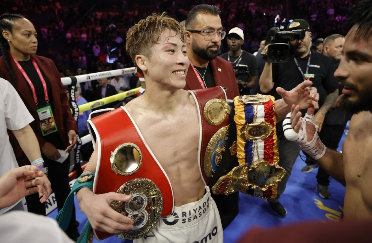 Inoue knocked down but stops Cardenas to keep crown