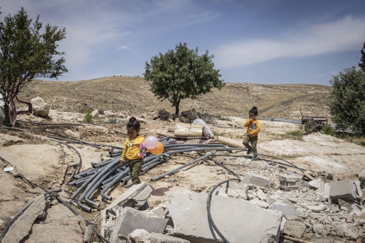 Zionists destroy West Bank hamlet, displacing about 100 Palestinians