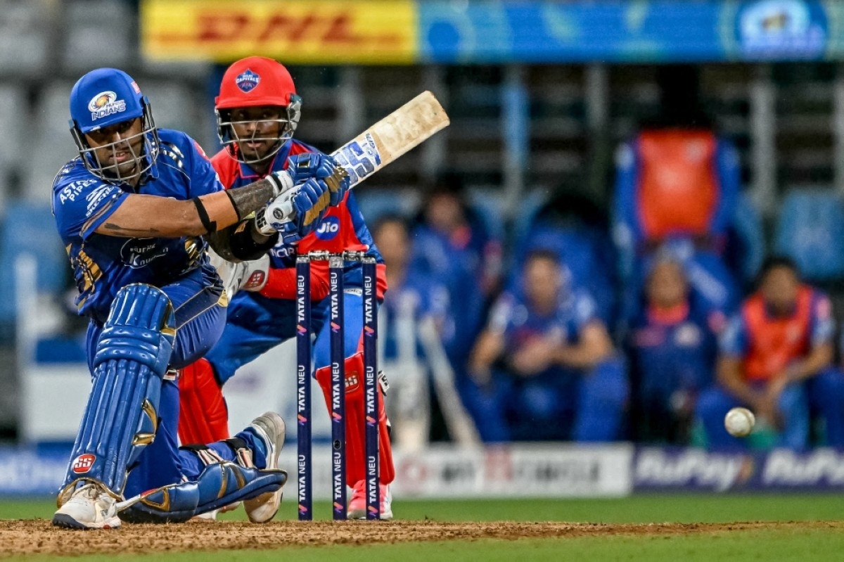 Suryakumar helps Mumbai crush Delhi to clinch playoff berth