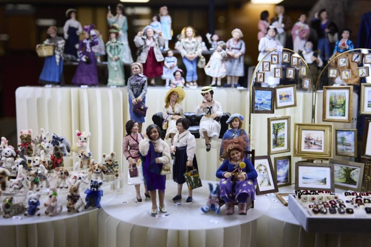 In troubled world, grown-ups find joy in doll's houses