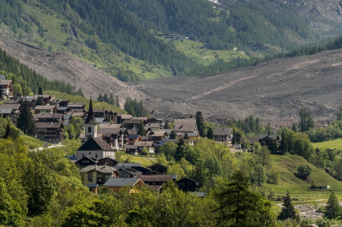 Swiss residents in shock after glacier debris buries village
