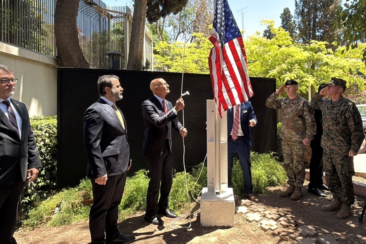 US flag raised in Damascus, $7 billion power deal inked