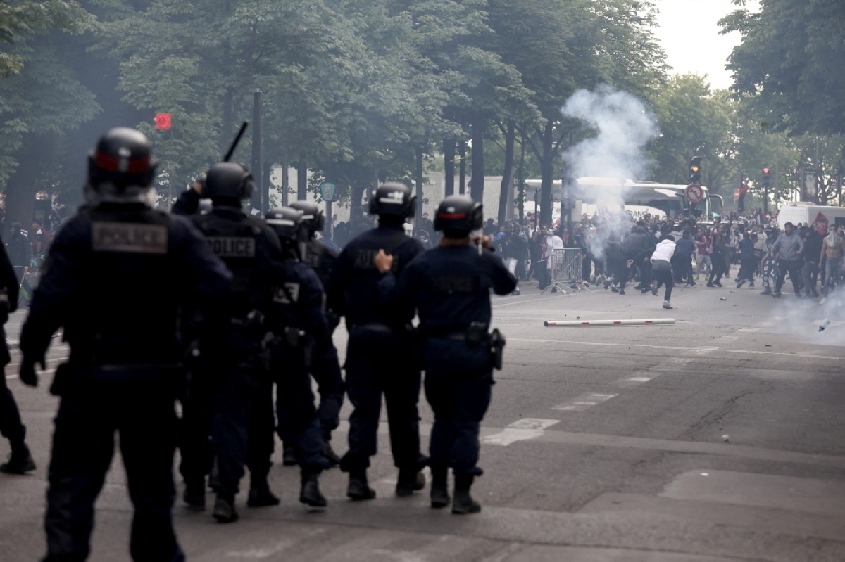 French police detain dozens after football celebrations