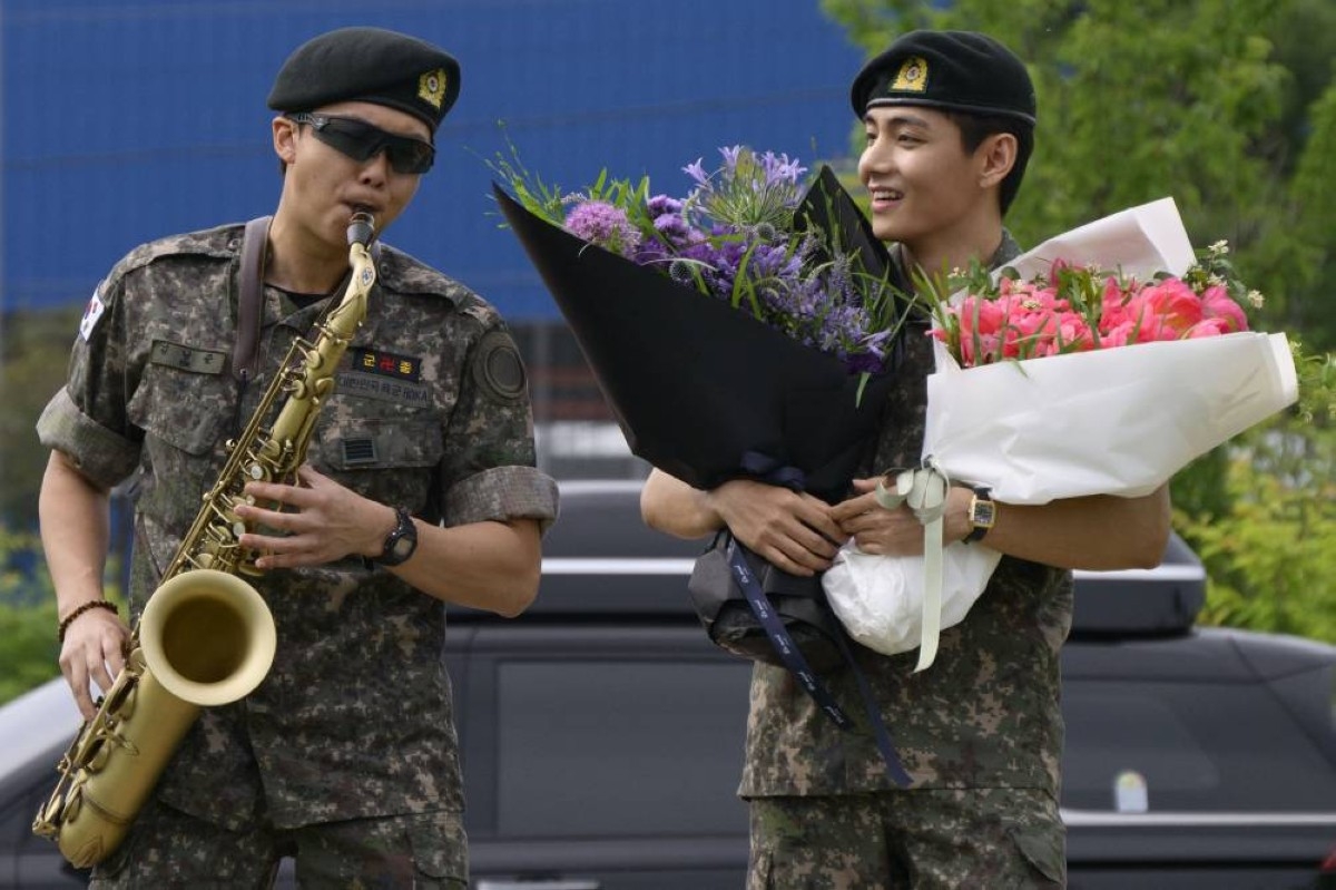 Two BTS megastars released from South Korea military