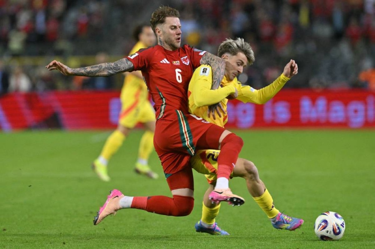 Belgium battle past Wales, Italy win in World Cup qualifying