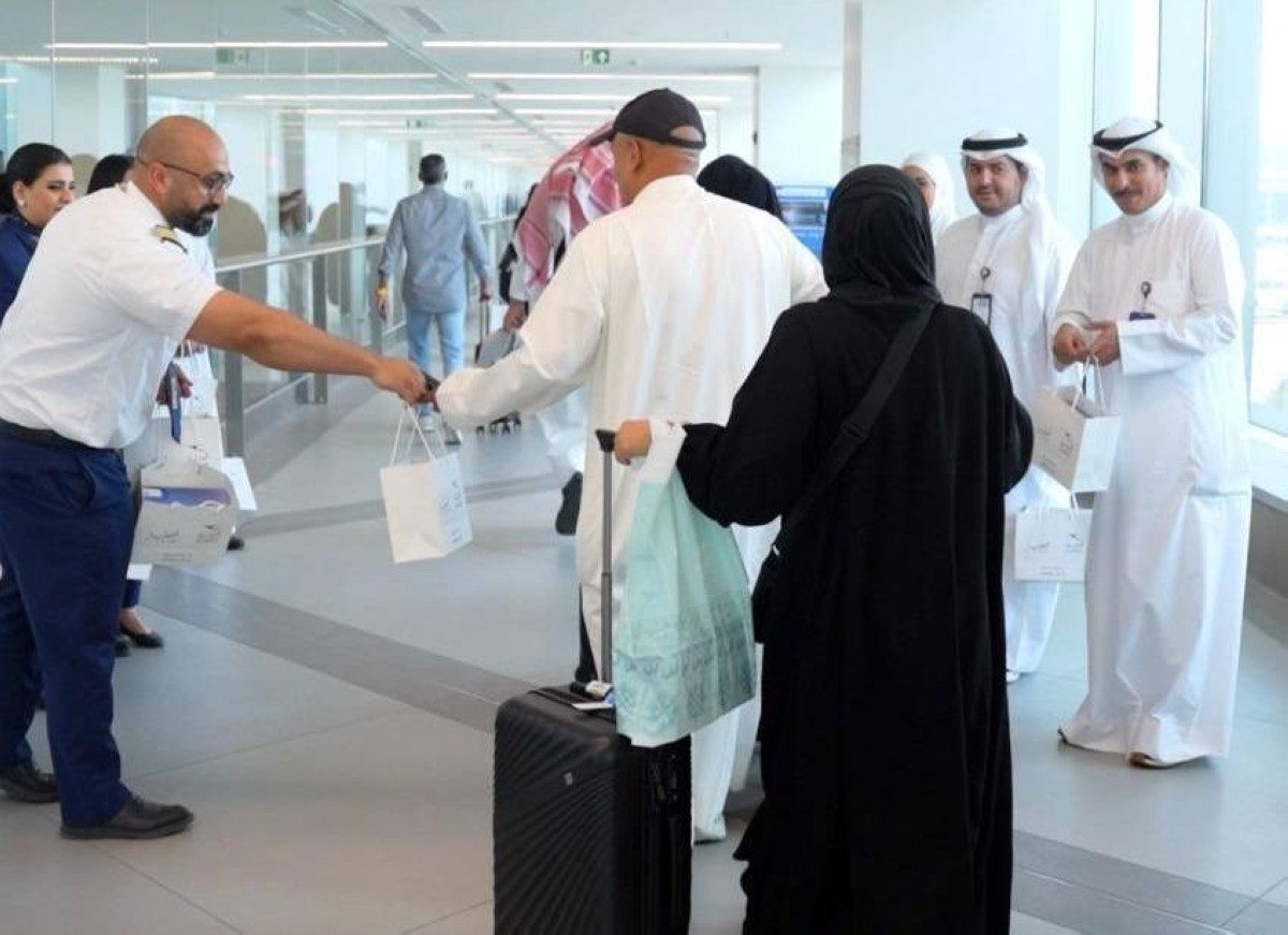 Returning pilgrims welcomed home at Kuwait International Airport
