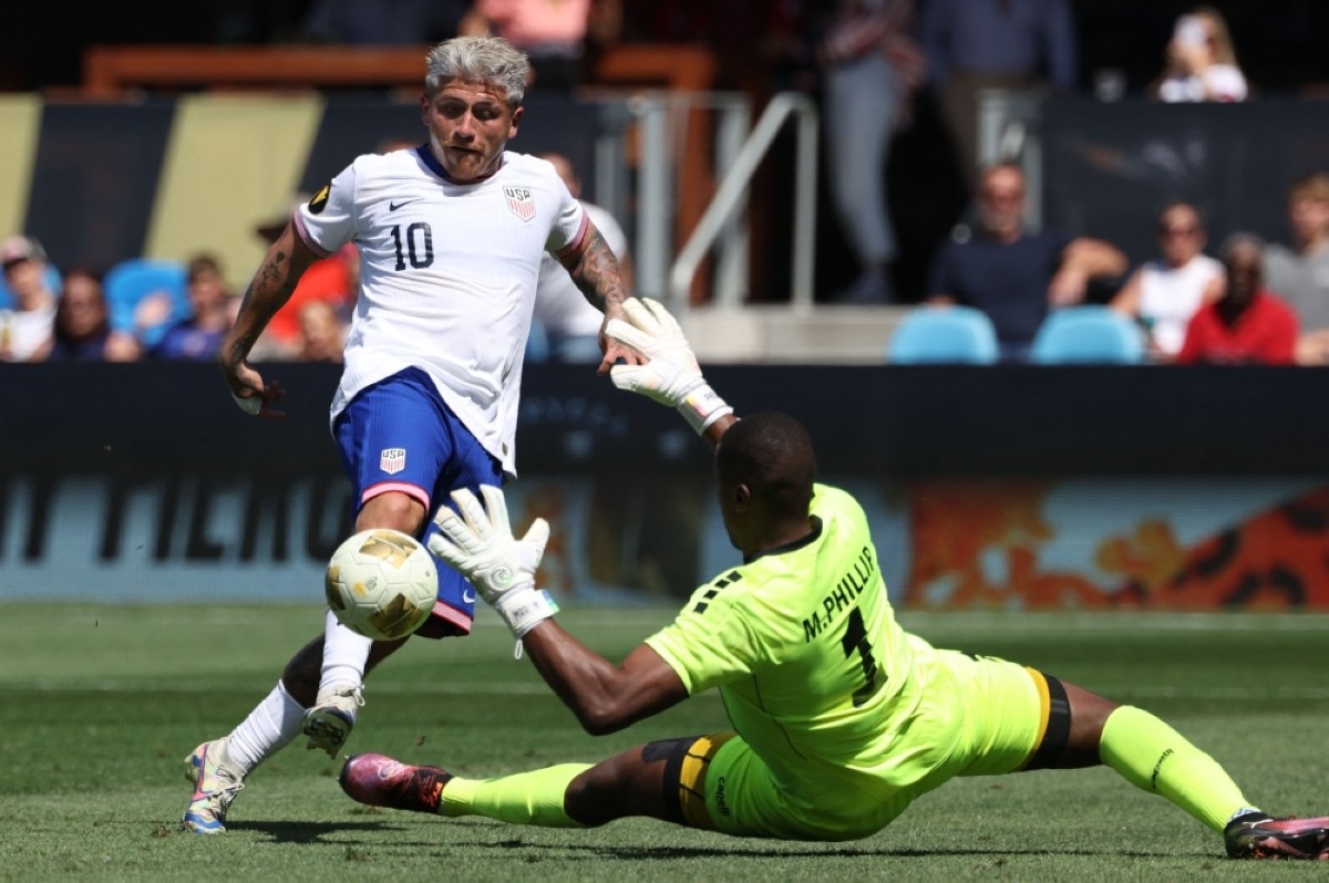 USA end losing streak with crushing of hapless Trinidad