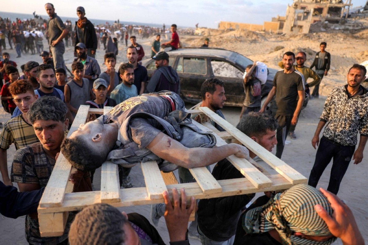 Zionists slaughter 140 in Gaza, raid West Bank camps