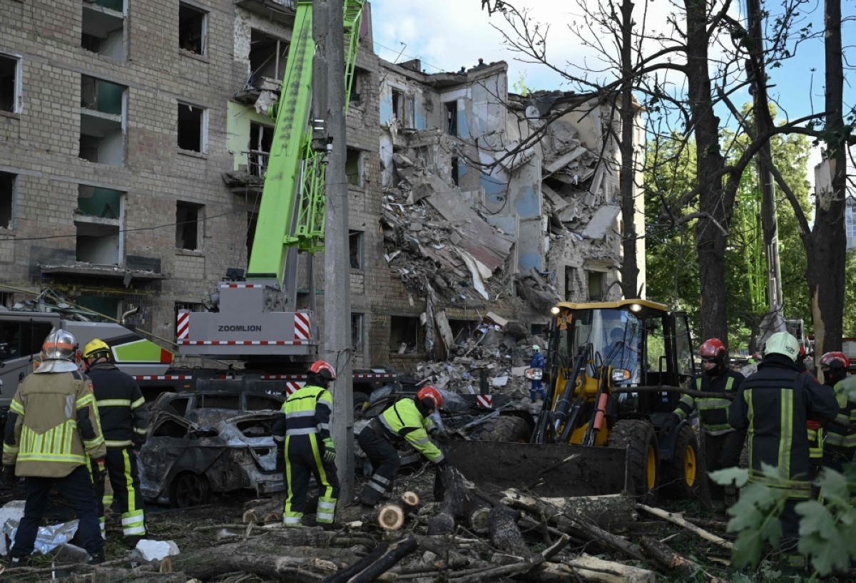 Russian drone and missile barrage kills eight in Kyiv