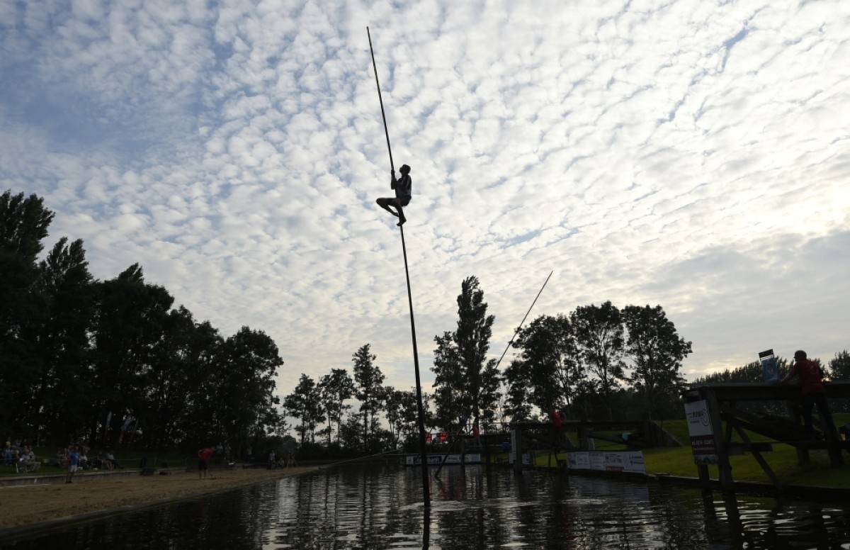 Canal-leaping pole vaulters aim for the sky