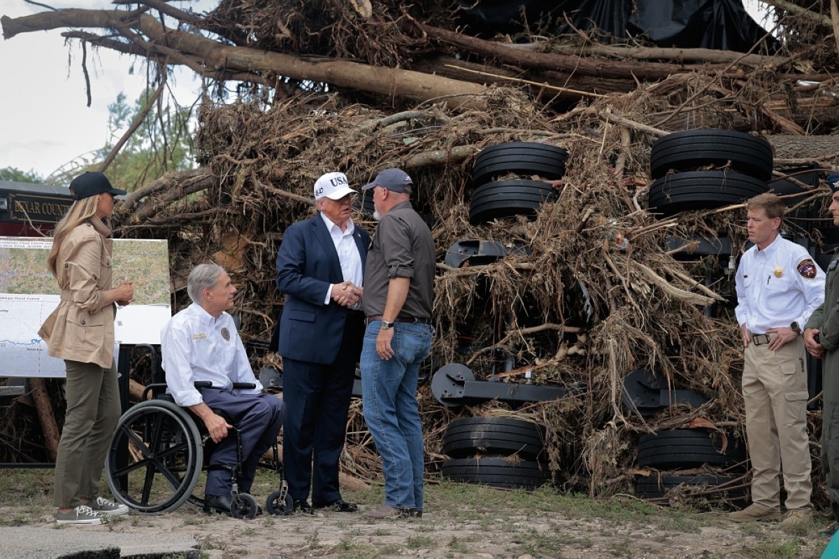 Trump visits Texas flood zone, defends govt disaster response
