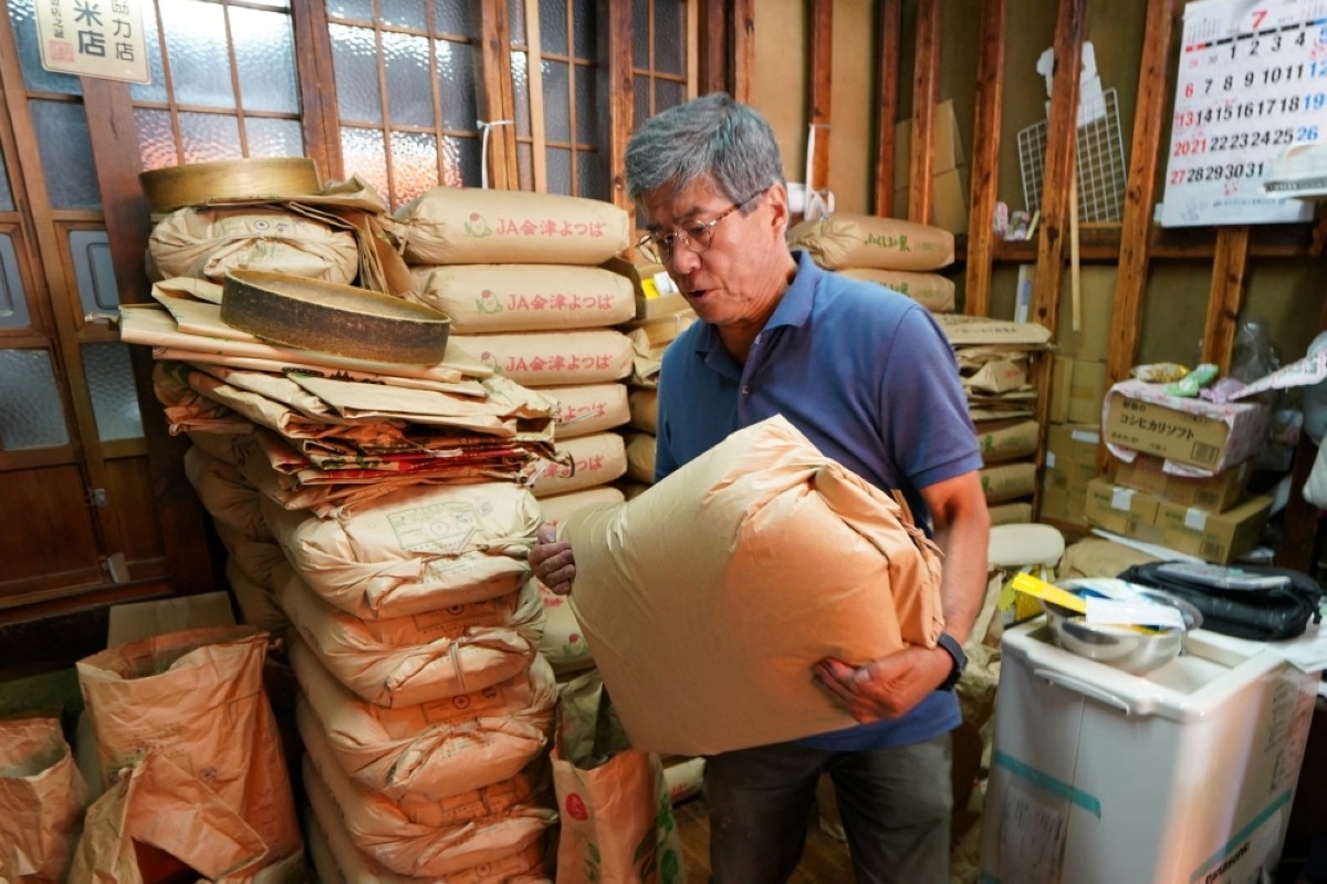 Japan rice prices double, raising pressure on PM