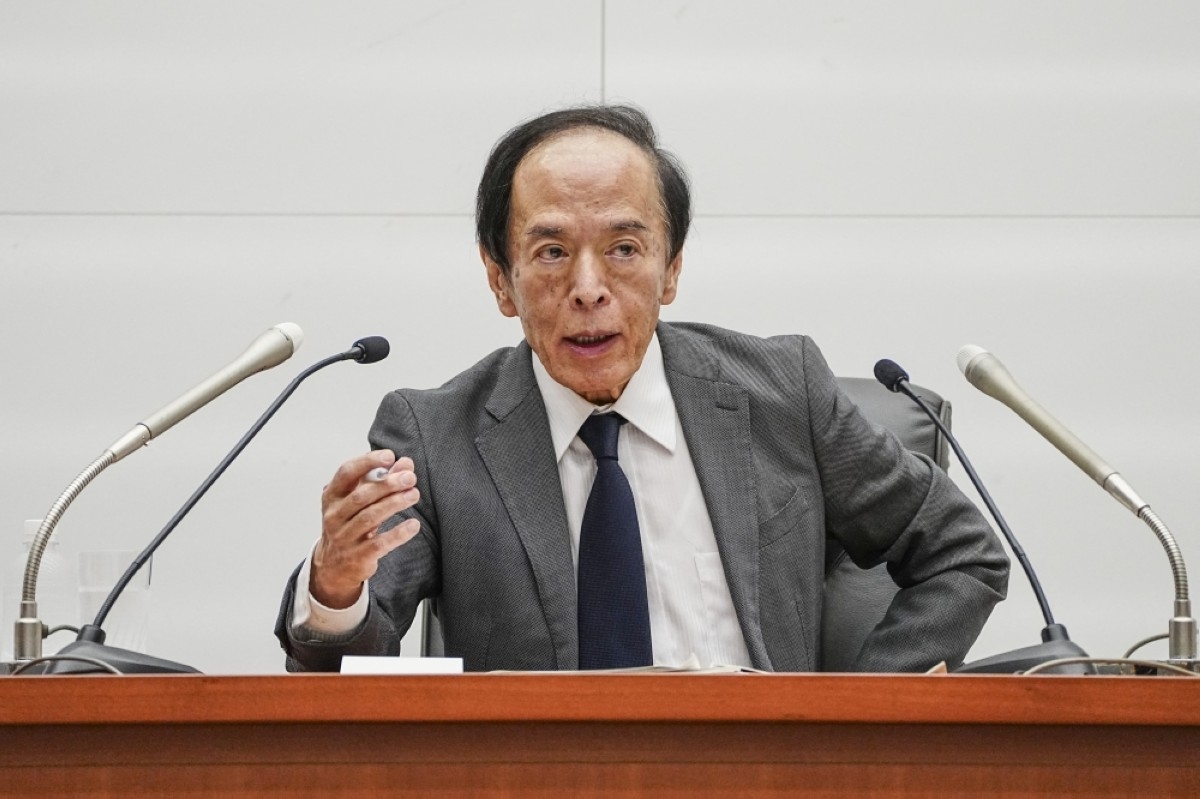 BoJ holds rates, flags trade ‘uncertainties'