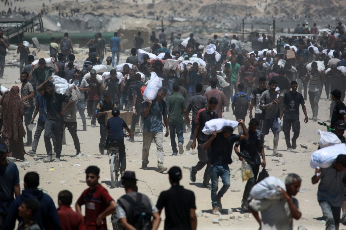 Chaos, gangs, gunfire: Gaza aid fails to reach most needy