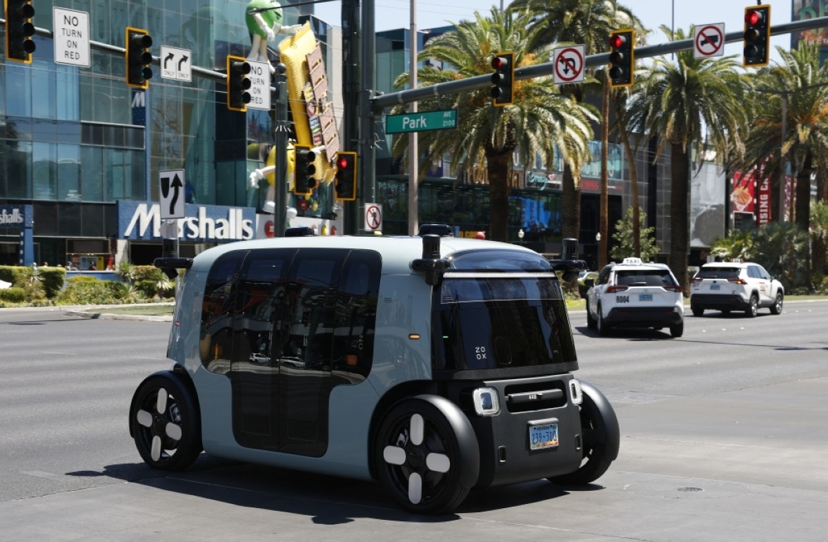 Eyeing robotaxis, Tesla hires test car operator