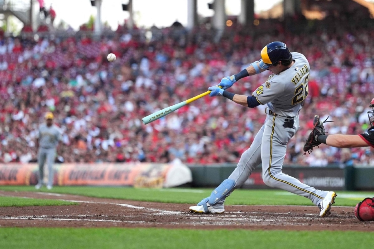 Brewers rally for record-tying 13th straight win