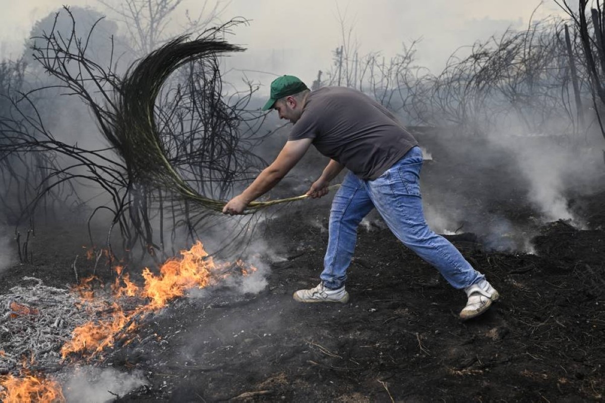 Spain battles 20 major wildfires, deploys troops
