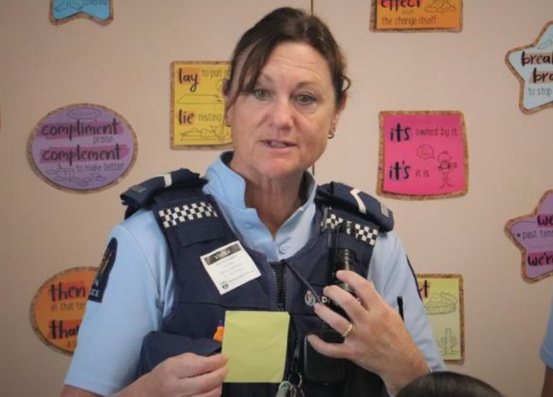 Commissioner Congratulates Honours Recipient