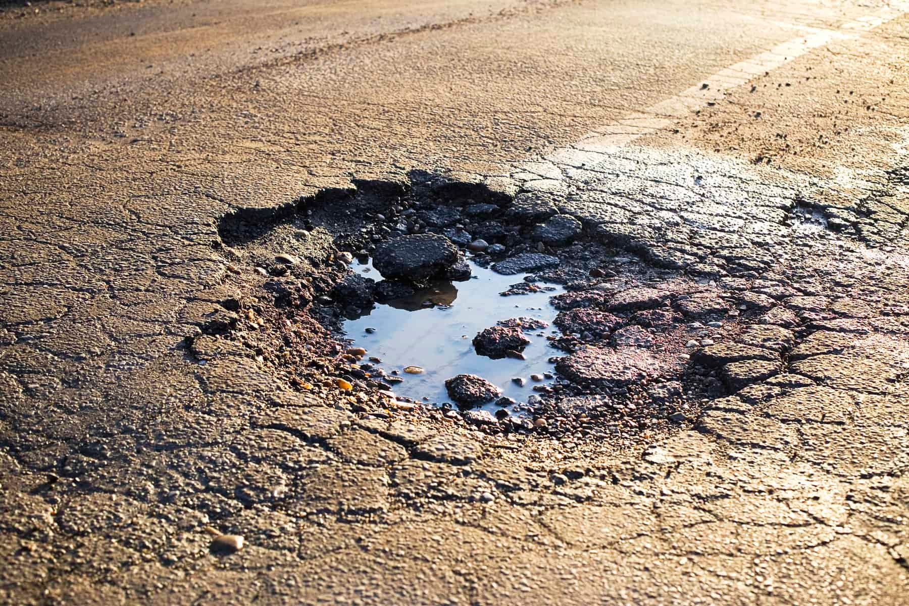 Tshwane mayor blames rain for municipality not fixing potholes