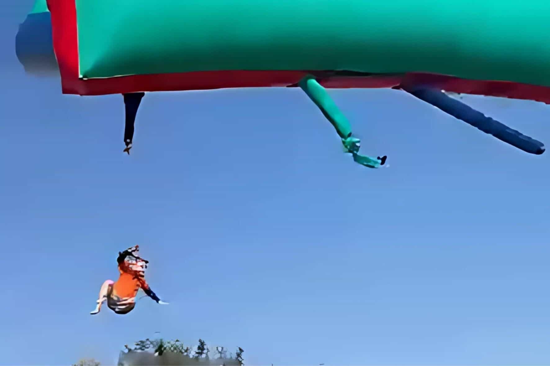 WATCH: Children fall from airborne jumping castle
