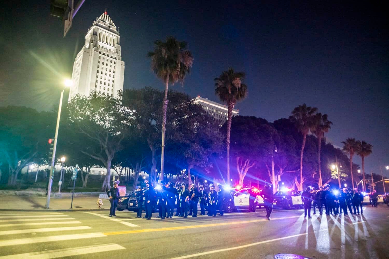 Police make ‘mass arrests' in LA during nighttime curfew