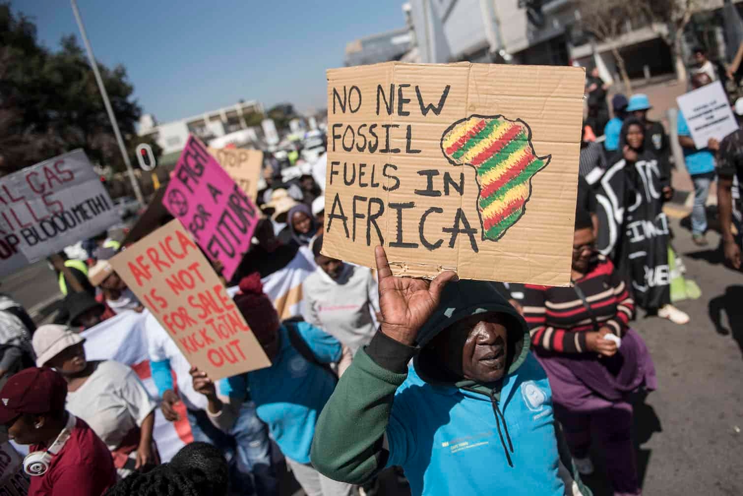 VIDEO/PICTURES: Environmental activists march to kick polluters out of Africa