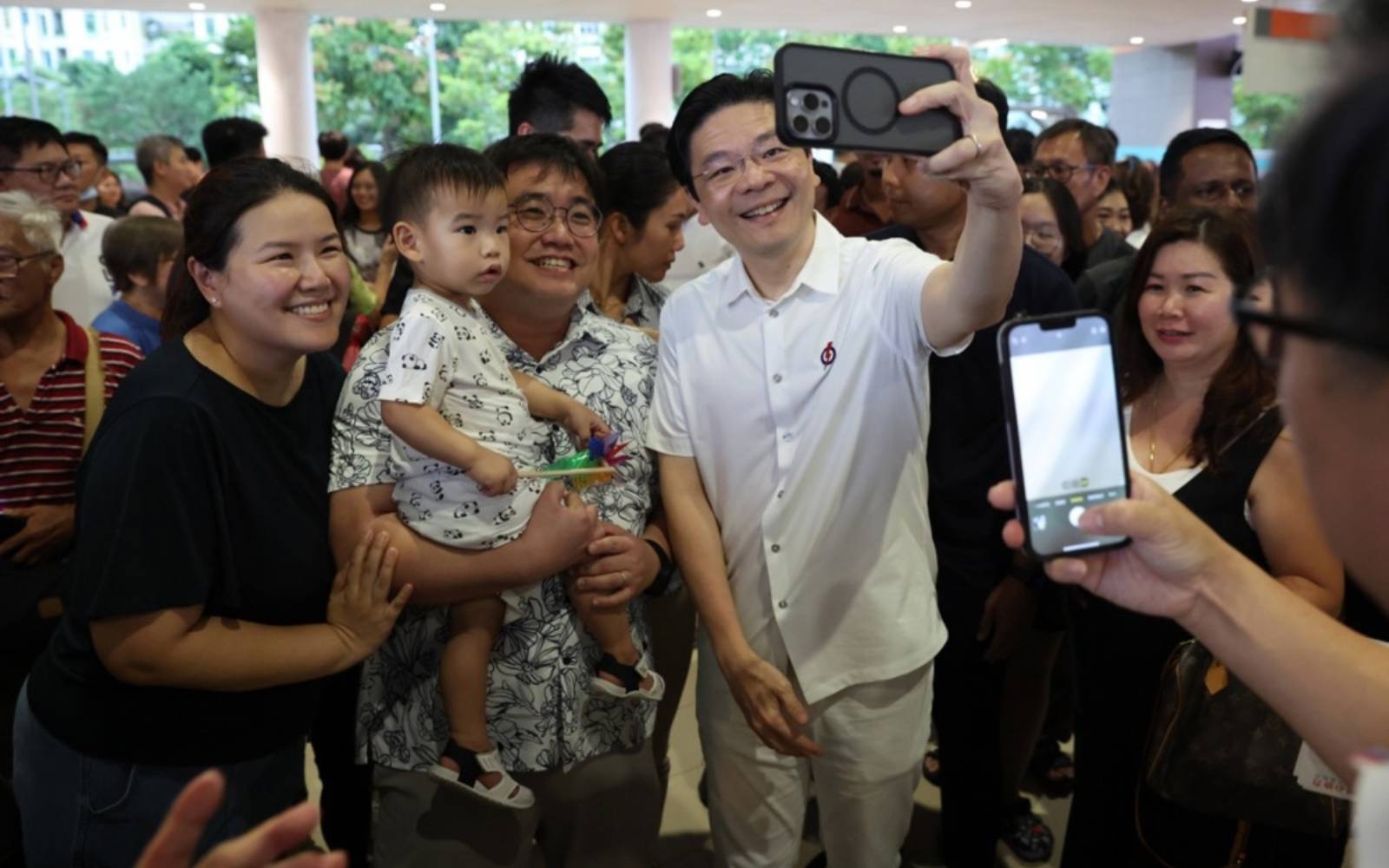 Singaporean PM asks voters to re-elect ministers who face rare close races