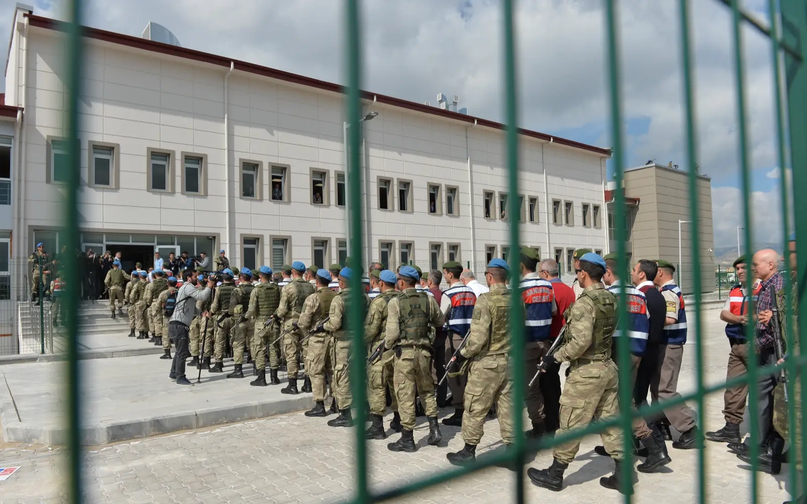 Turkey arrests 65 soldiers, police for ties to late Erdogan foe