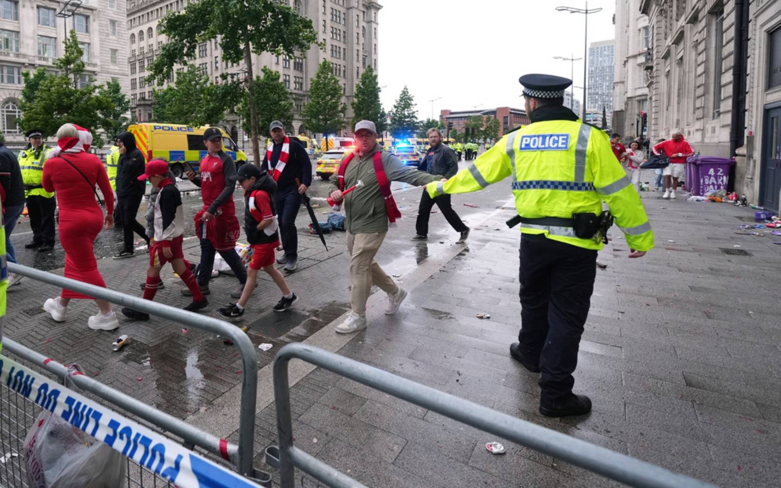 Football unites after car ploughs into Liverpool victory parade