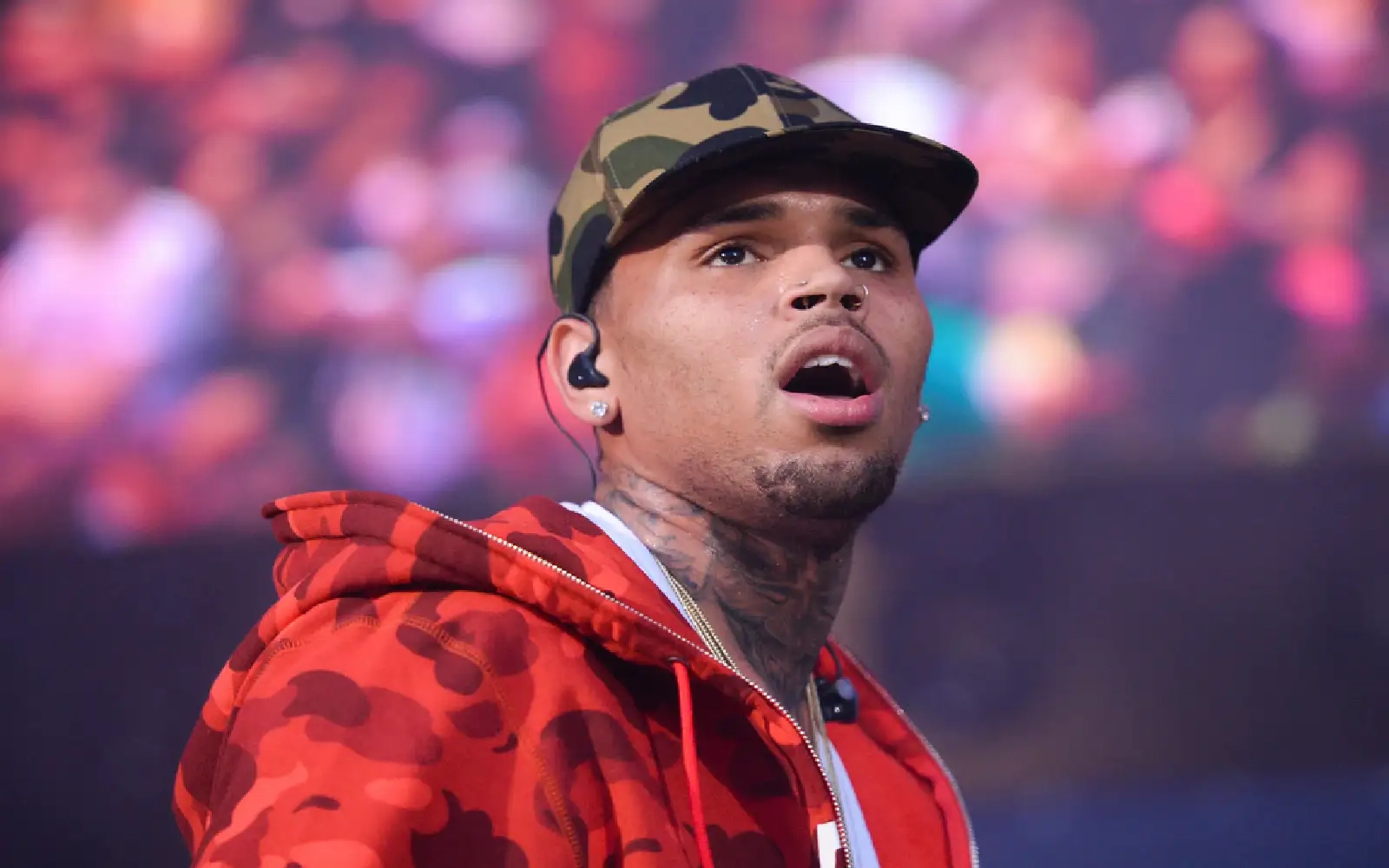 UK police charge rapper HoodyBaby in case involving Chris Brown